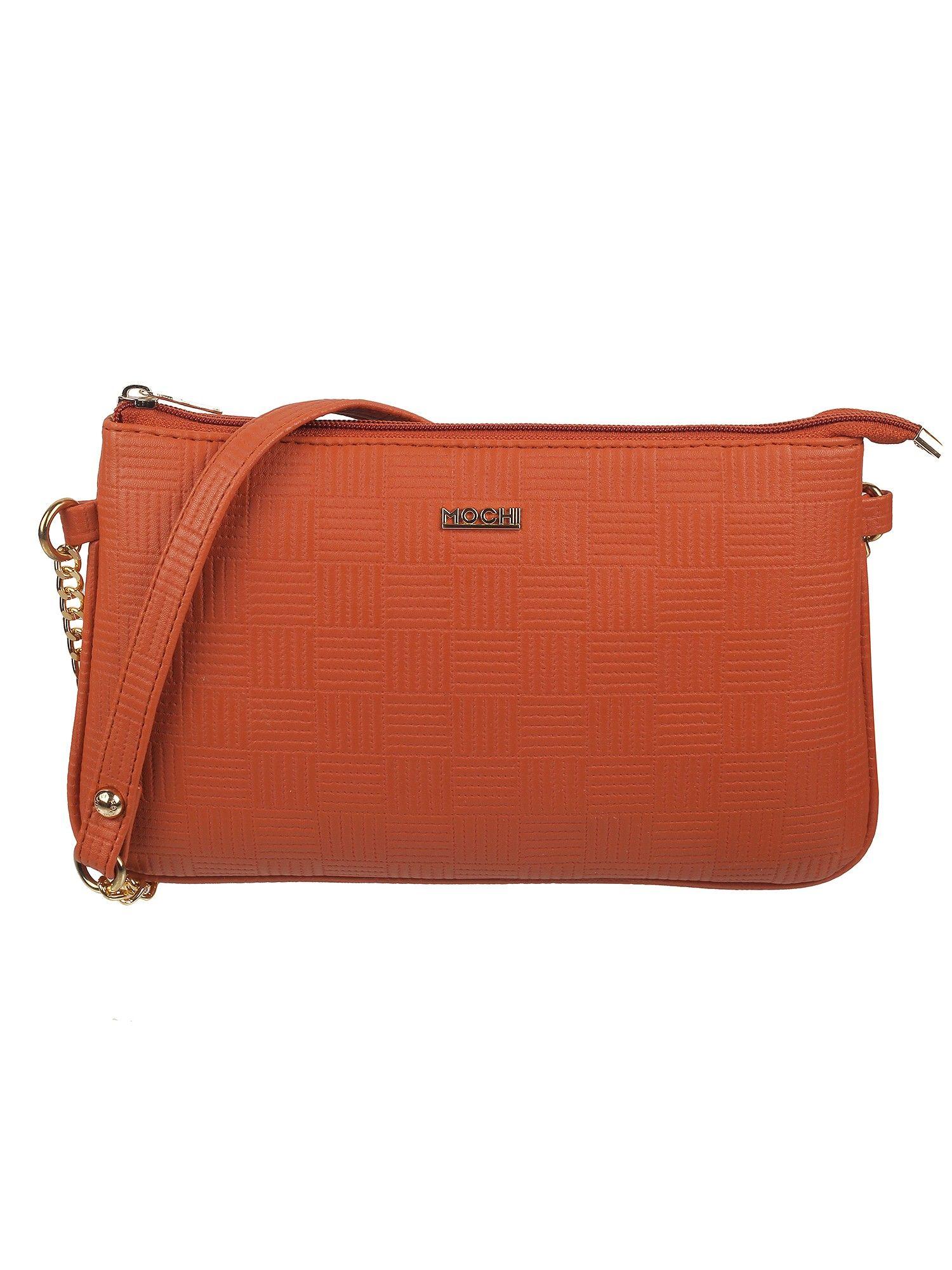 women orange synthetic sling and cross bag