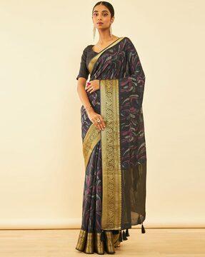 women paisley print saree with tassels