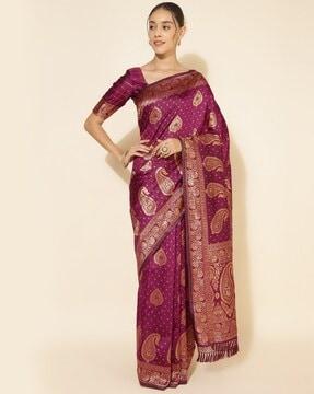 women paisley woven saree with contrast border & tassels