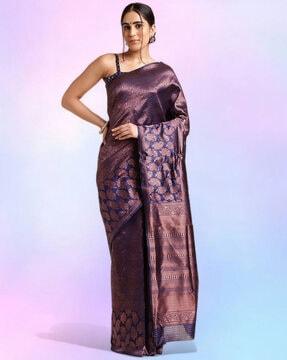women paisley woven saree with contrast border