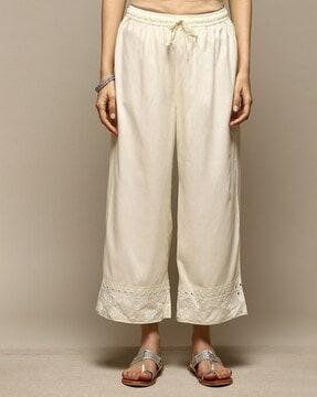 women palazzos with embroidered hem