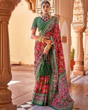 women patola print saree with tassels