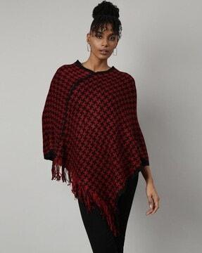 women patterned-knit poncho with tassels