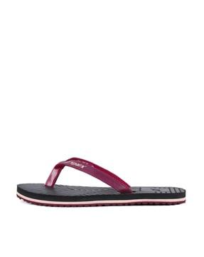 women patterned thong-strap flip-flops