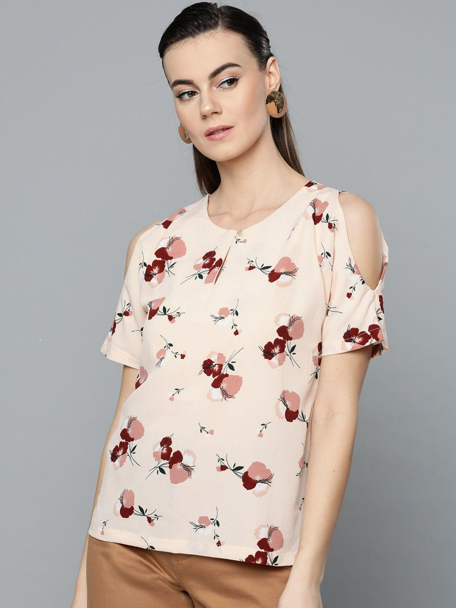 women peach coloured cold shoulder printed top