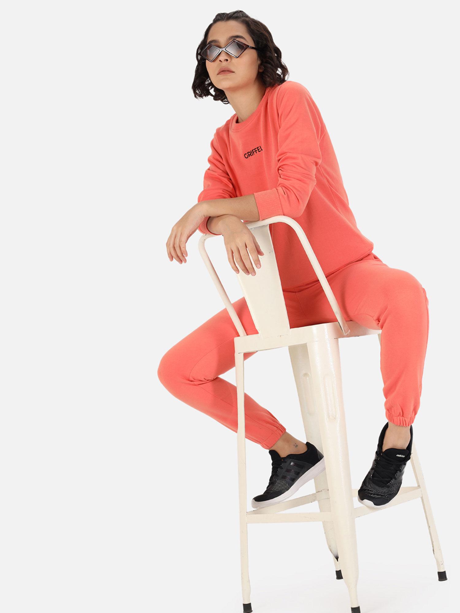 women peach comfortable fit tracksuit