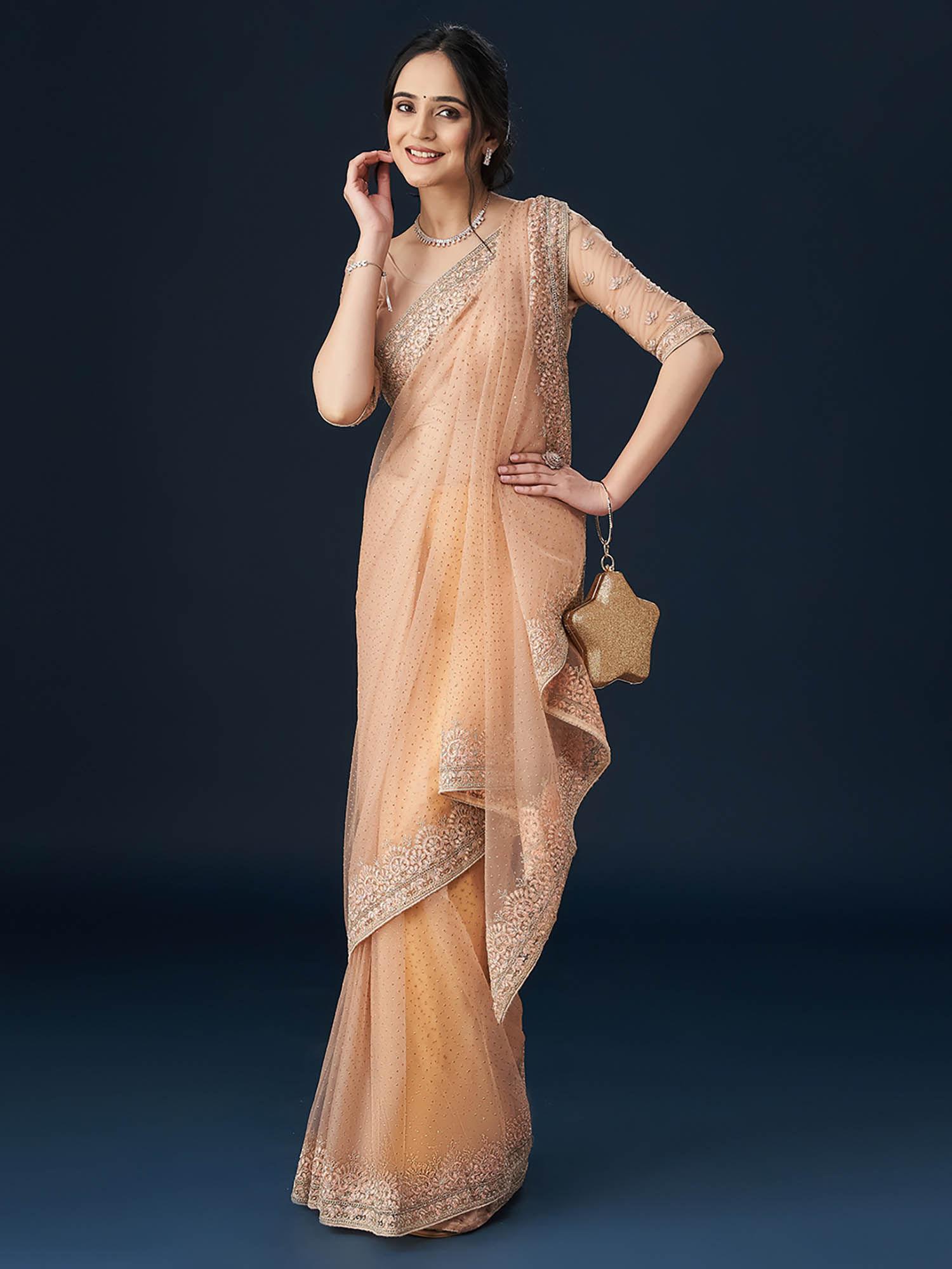 women peach embellished saree with unstitched blouse