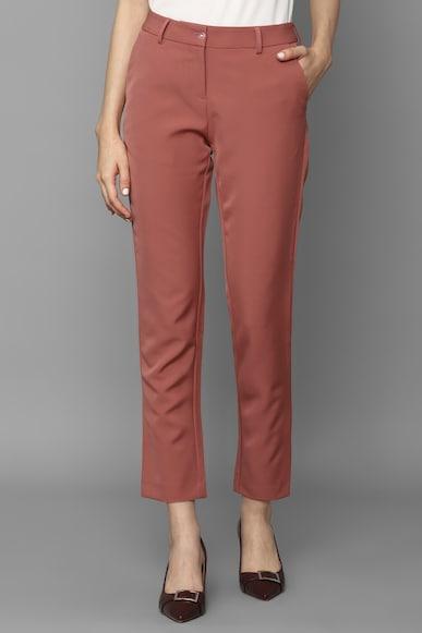 women peach regular fit solid casual trousers