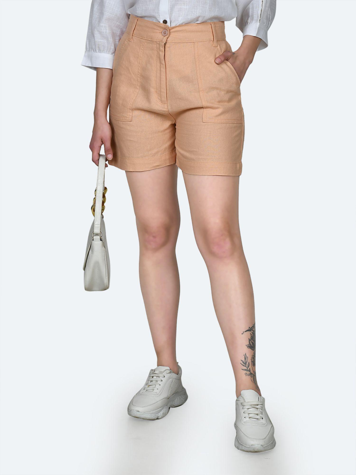 women peach solid shorts