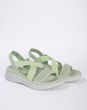 women perforated criss-cross sandals