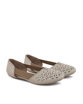 women perforated slip-on shoes