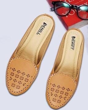 women perforated slip-on shoes