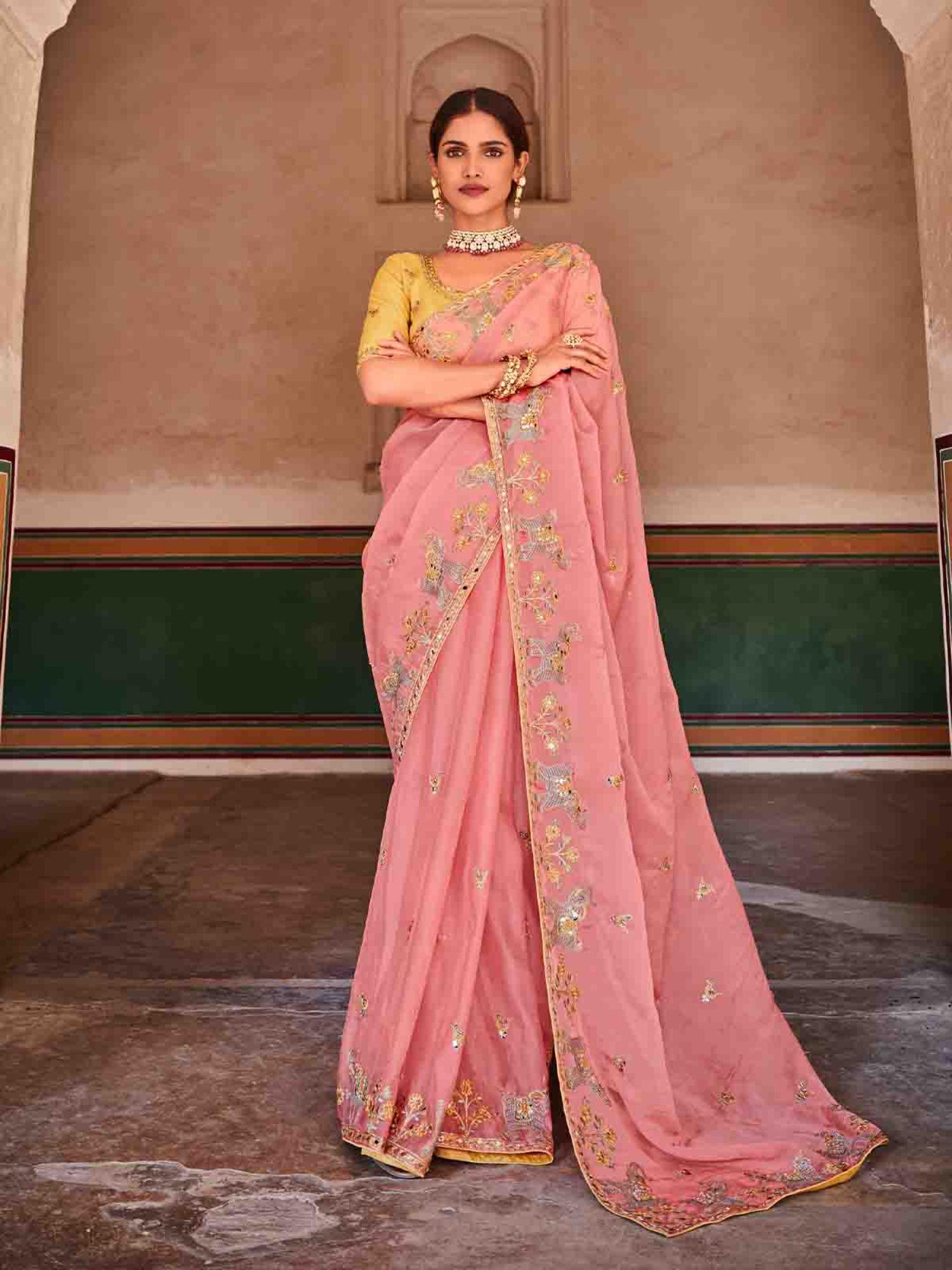 women pink organza embroidered saree with unstitched blouse