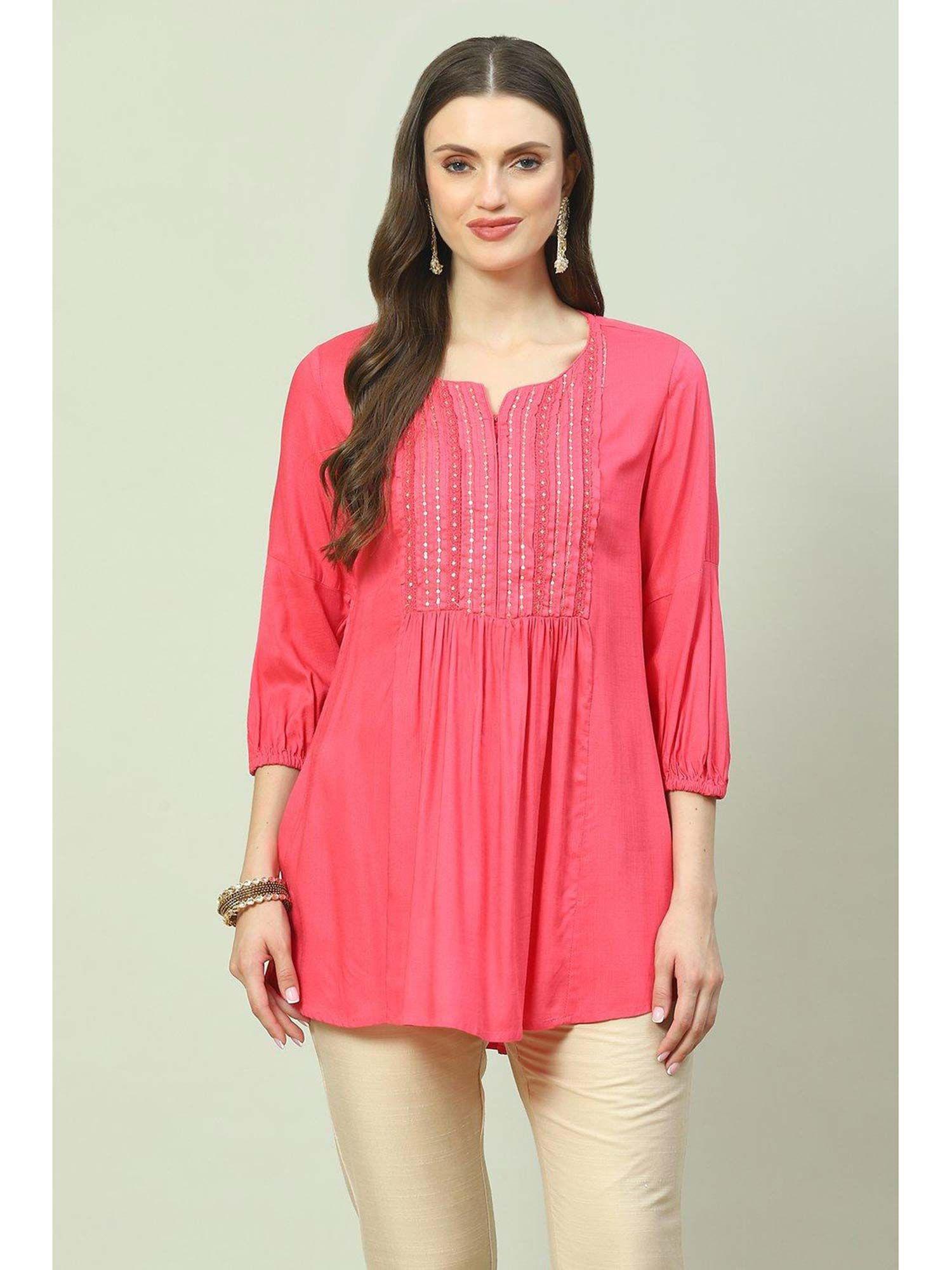 women pink sequined tunic