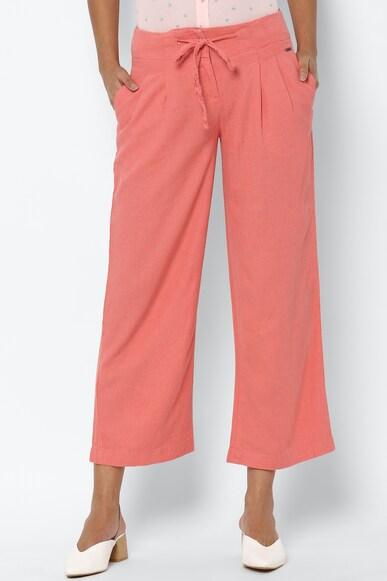 women pink slim fit textured casual trousers