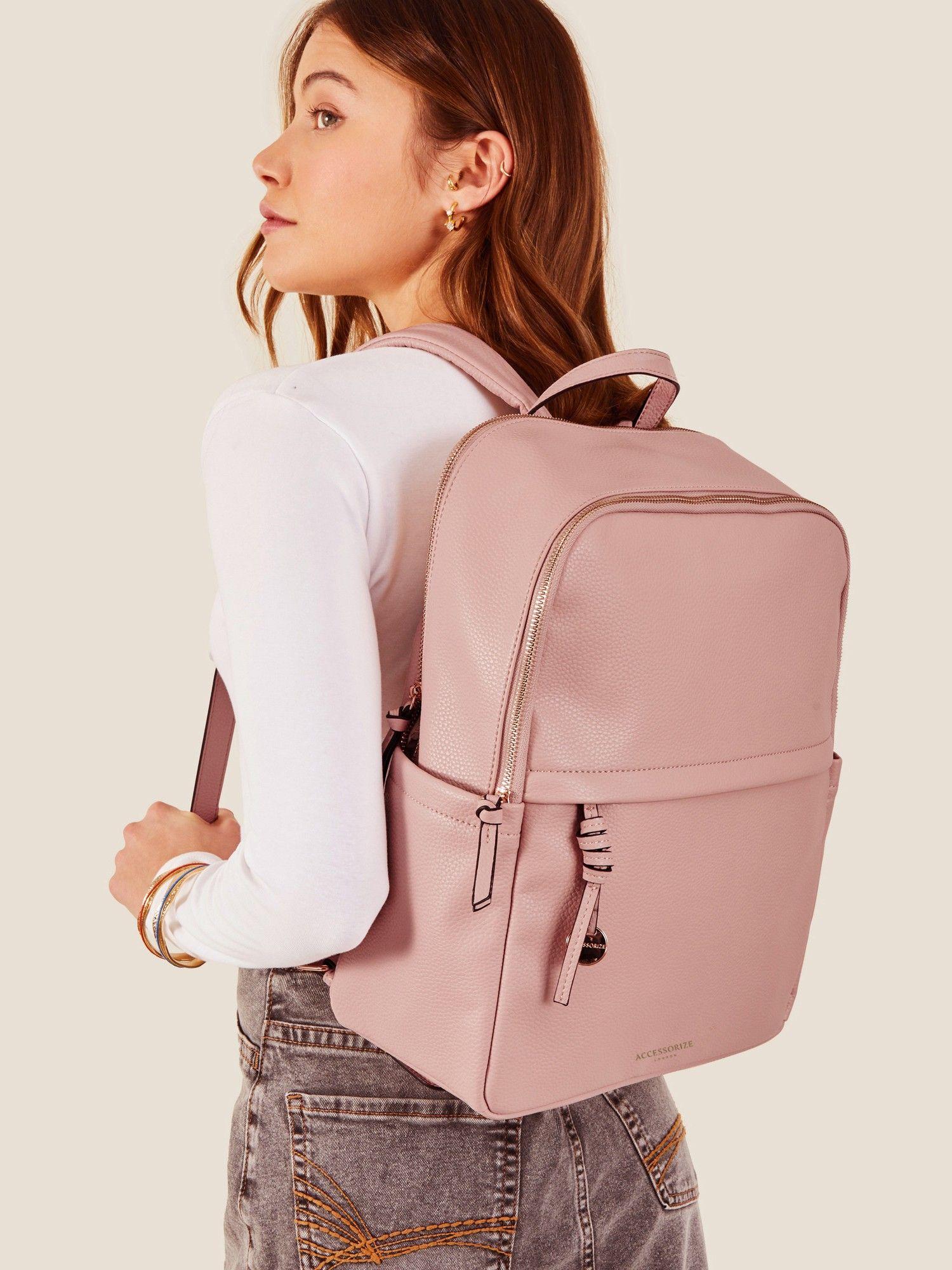 women pink zip around backpack