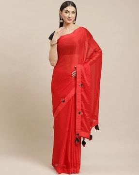 women plain saree with tassels & embroidered blouse piece