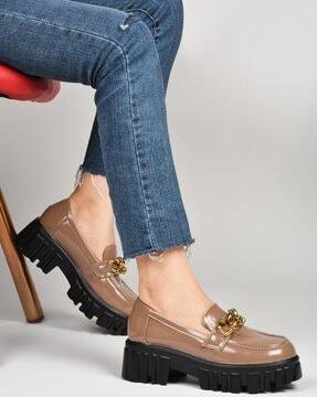 women platform-heeled shoes with chain accent
