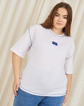 women plus oversized drop shoulder contrast stitch detail t-shirt with badge detail