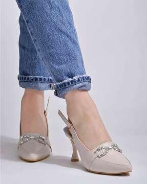 women pointed-toe pumps with buckle fastening