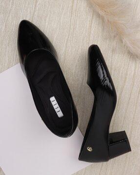 women pointed-toe pumps