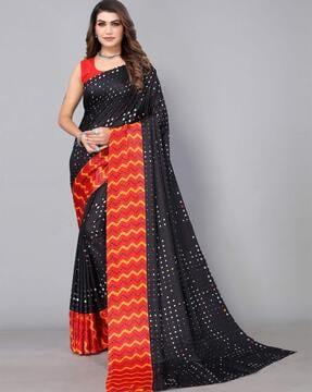 women polka-dot print saree with contrast border