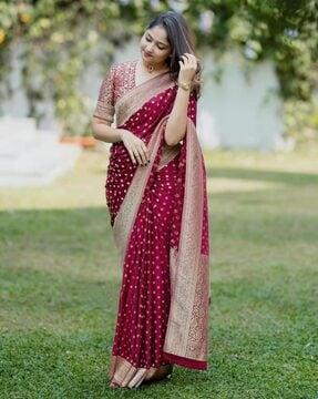 women polka-dot print saree with contrast border
