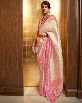 women polka-dot saree with contrast border