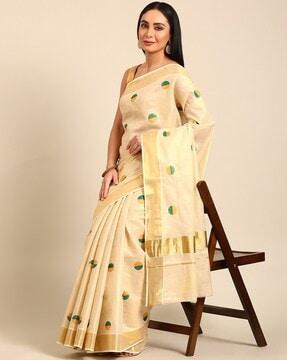 women polka-dot saree with zari border