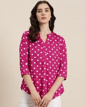 women polka-dot top with mandarin neck