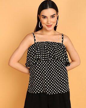 women polka-dot top with strappy sleeves