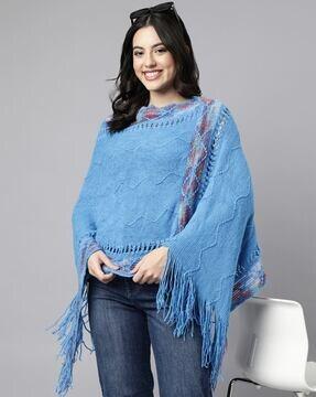 women poncho with frayed hem