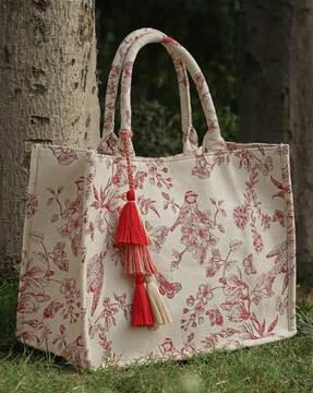 women printed handbag with tassels