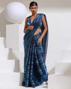 women printed organza saree with tassels