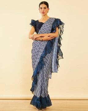 women printed pre-stitched ruffled saree with embellished blouse