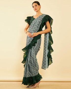 women printed pre-stitched ruffled saree with embellished blouse