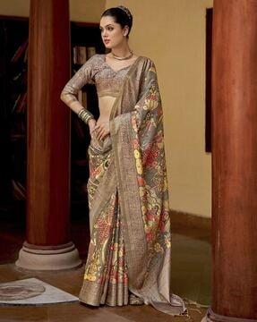 women printed saree with contrast border & tassels