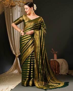 women printed saree with contrast border and tassels