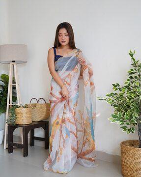 women printed saree with scalloped border