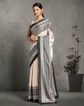 women printed saree with thin border