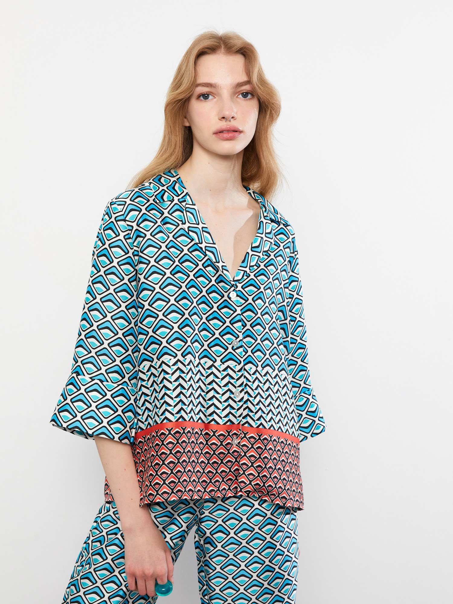 women printed satin blue top