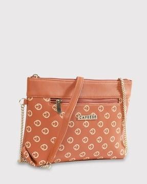 women printed sling bag with metal accent