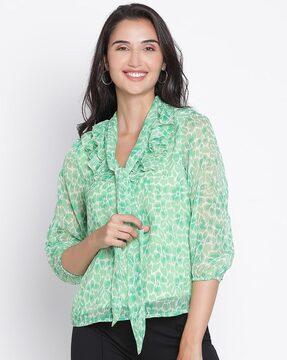 women printed top with ruffled details