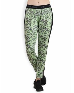 women printed track pants with signature branding