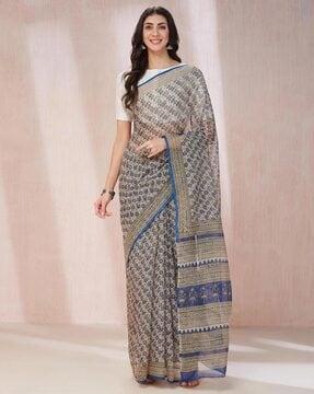 women pritned saree with contrast border