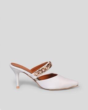 women pumps with metal accent