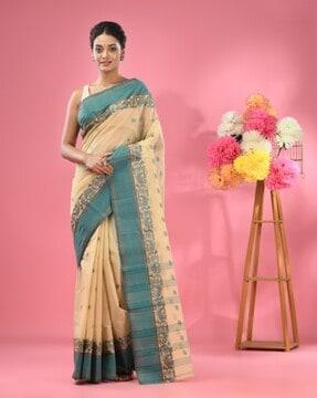 women pure cotton tant saree with woven motifs