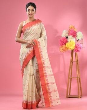 women pure cotton tant saree with woven motifs