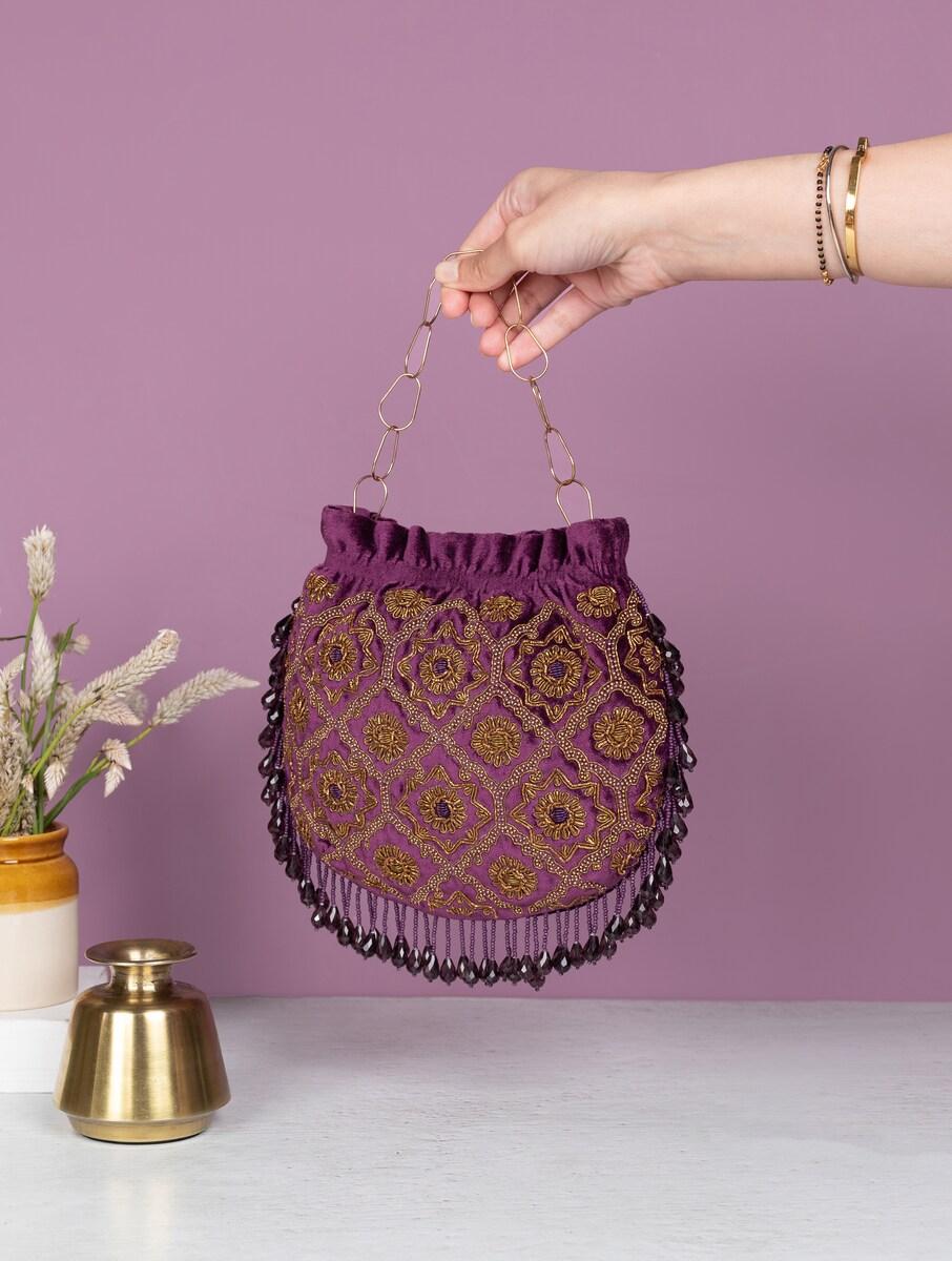 women purple cotton potli