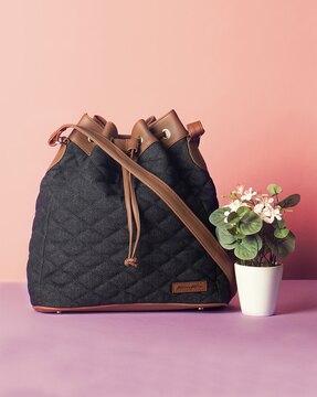 women quilted drawstring bucket bag